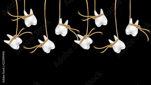 teeth hanging on a rope