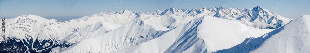 Tatry mountains panorma seen from Western Tatry during sunny winter day.