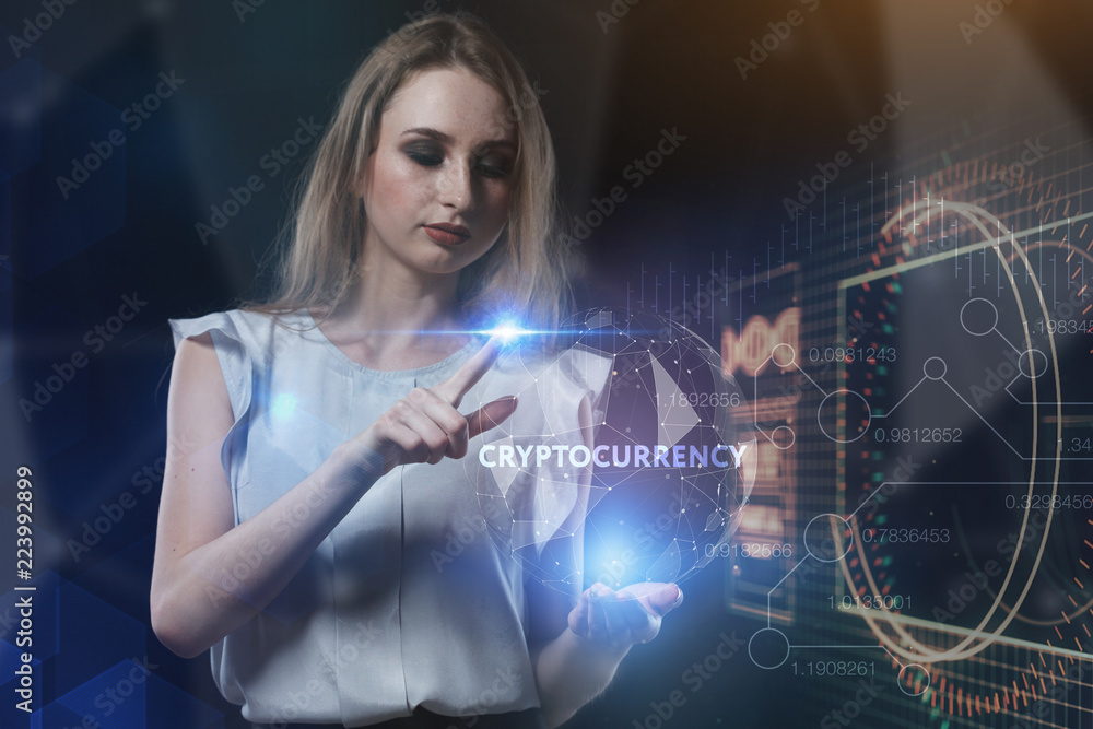 The concept of business, technology, the Internet and the network. A young entrepreneur working on a virtual screen of the future and sees the inscription: Cryptocurrency The concept of business, technology, the Internet and the network. A young entrepreneur working on a virtual screen of the future and sees the inscription: Cryptocurrency