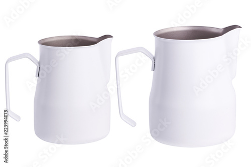 White Metal pitcher for coffee making. Barista tool. Milk pitcher. Set of pithers. Isolated
