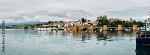 San Vicente de la Barquera from the harbor photo