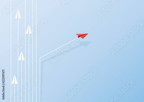 Paper airplanes flying on blue sky and cloud.Paper art style of business teamwork and one different vision creative concept idea.Vector illustration photo