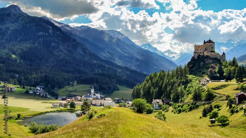 Mountains surrounding Tarasp, a village in the canton of Graubunden, Switzerland. It is dominated by the famous castle overlooking the village. 