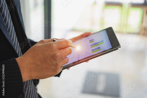 close up businessman using tablet