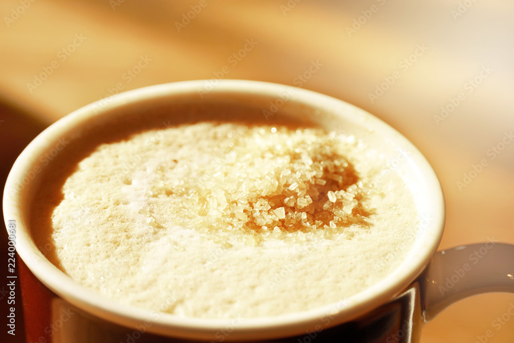 organic brown sugar latte coffee milk foam hot drink in ceramic mug in warm morning cafe background organic brown sugar latte coffee milk foam hot drink in ceramic mug in warm morning cafe background
