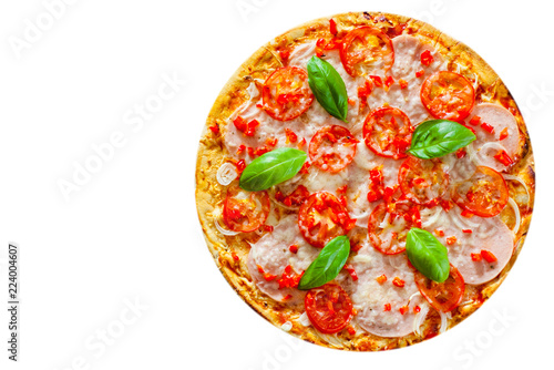 sliced Pizza with Mozzarella cheese, Ham, Tomatoes, pepper, Spices and Fresh Basil. Italian pizza isolated on white background. with copy space. top view