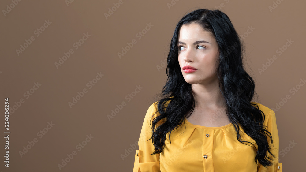 Portrait of a young woman on a solid background Portrait of a young woman on a solid background