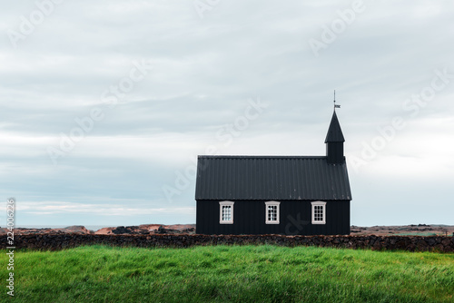 Black wooden church Budakirkja at Snaefellsnes, western Iceland, Europe.