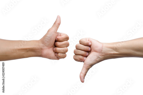 Thumbs up and thumbs down on white background photo
