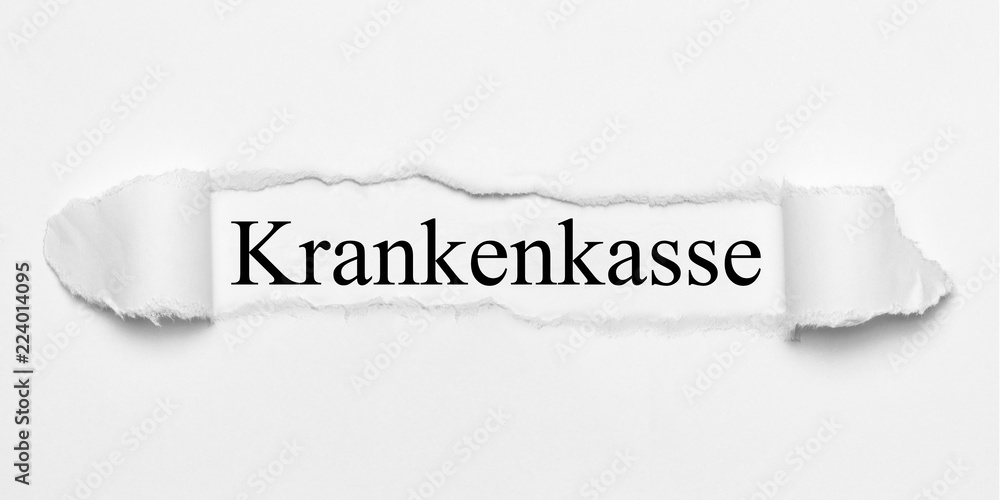 Obraz premium Krankenkasse auf weißen gerissenen Papier