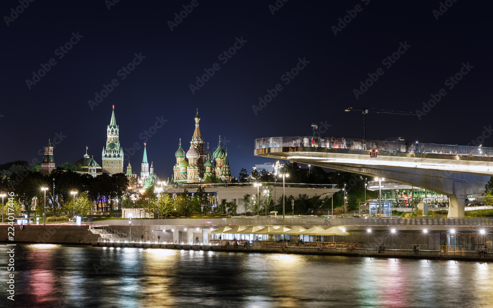 movement of water and motor transport on the river and embankment near the Kremlin and Moscow river from Zaryadye urban landscape park. Moscow, Russia