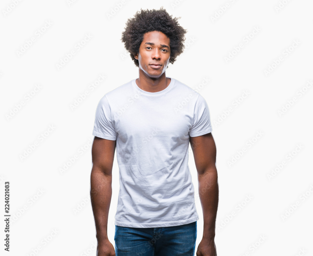 Afro american man over isolated background with serious expression on face. Simple and natural looking at the camera. Afro american man over isolated background with serious expression on face. Simple and natural looking at the camera.