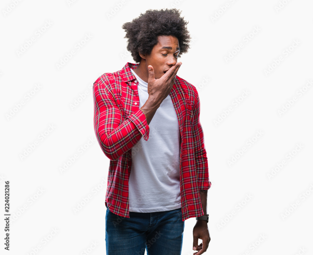 Afro american man over isolated background bored yawning tired covering mouth with hand. Restless and sleepiness. Afro american man over isolated background bored yawning tired covering mouth with hand. Restless and sleepiness.