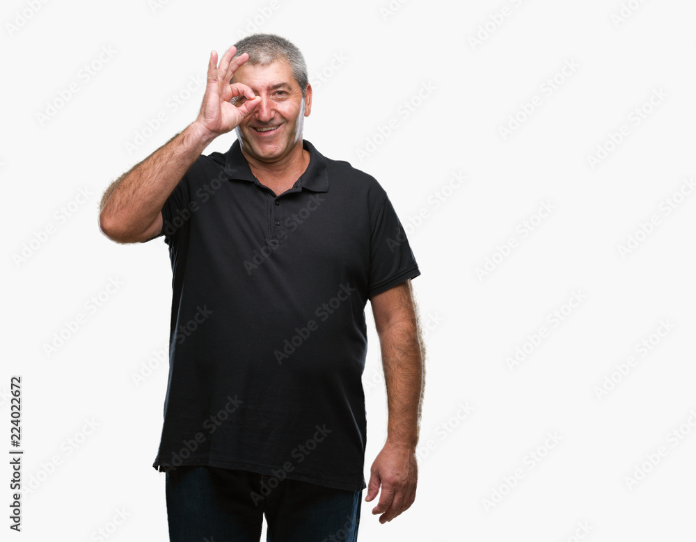 Handsome senior man over isolated background doing ok gesture with hand smiling, eye looking through fingers with happy face. Handsome senior man over isolated background doing ok gesture with hand smiling, eye looking through fingers with happy face.