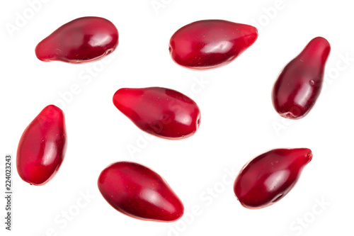 Red berries of cornel or dogwood isolated on white background. Top view. Flat lay