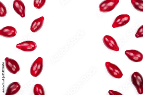 Red berries of cornel or dogwood isolated on white background with copy space for your text. Top view. Flat lay