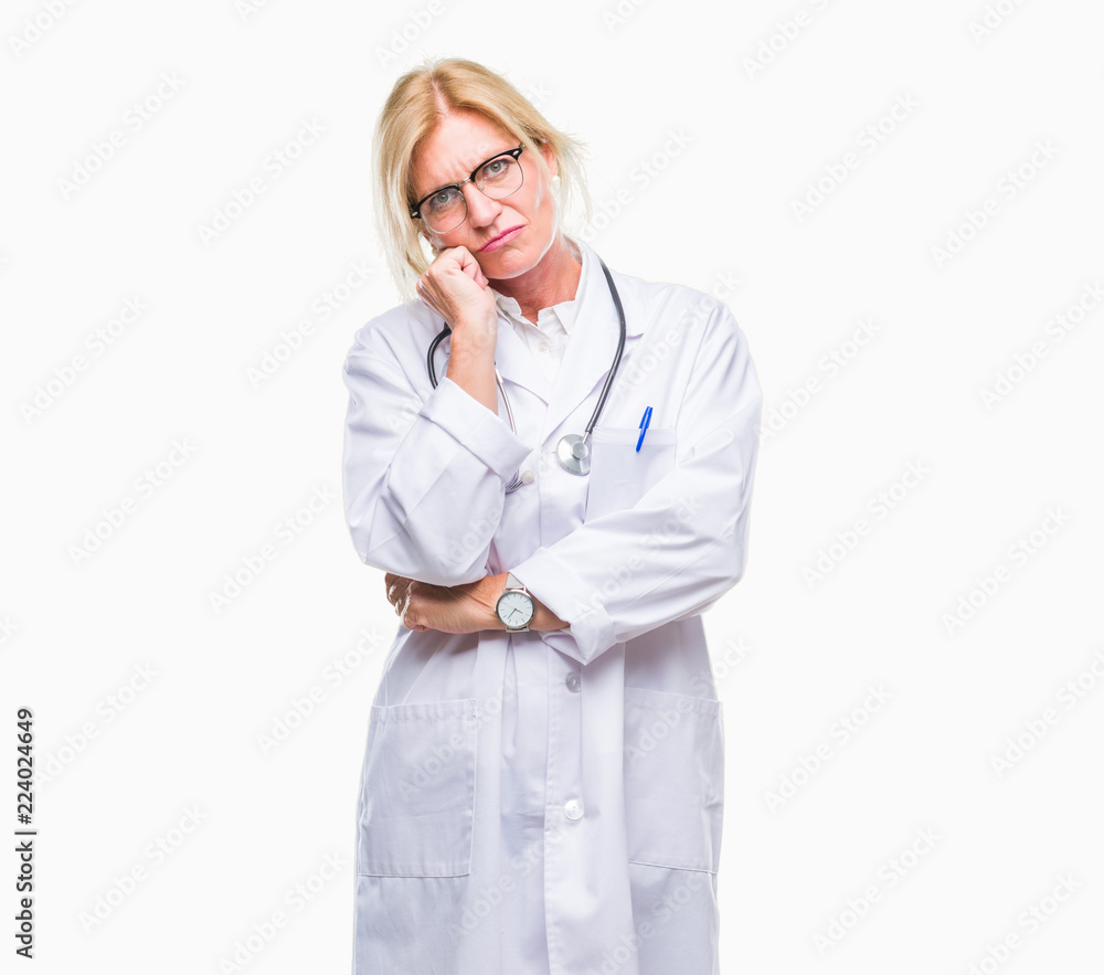 Middle age blonde doctor woman over isolated background thinking looking tired and bored with depression problems with crossed arms. Middle age blonde doctor woman over isolated background thinking looking tired and bored with depression problems with crossed arms.