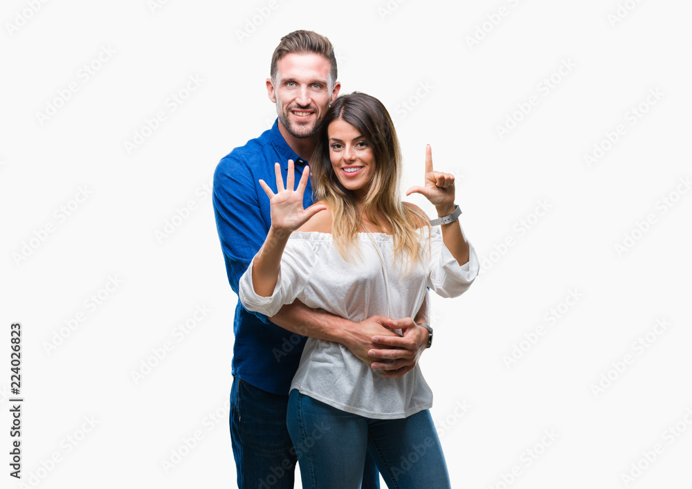 Young couple in love over isolated background showing and pointing up with fingers number seven while smiling confident and happy. Young couple in love over isolated background showing and pointing up with fingers number seven while smiling confident and happy.