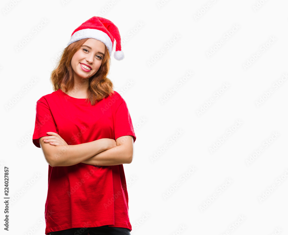 Young beautiful woman over isolated background wearing christmas hat happy face smiling with crossed arms looking at the camera. Positive person. Young beautiful woman over isolated background wearing christmas hat happy face smiling with crossed arms looking at the camera. Positive person.