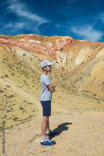 Teen boy in valley of Mars ...