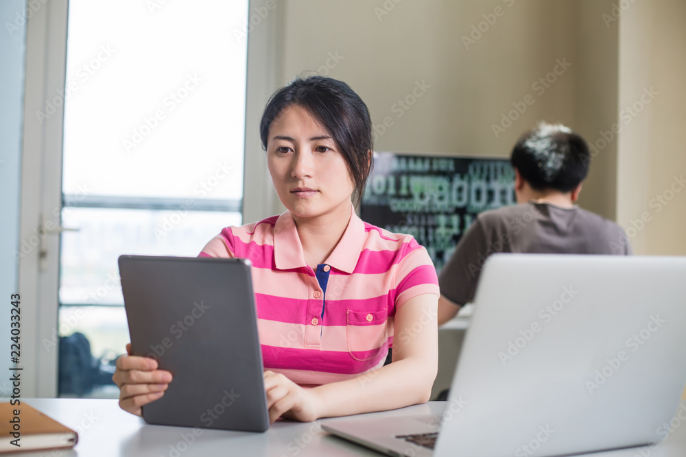 young woman working with computer
