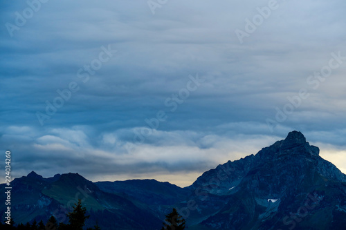 Alpine scene in the Swiss mountains: Sunset and storm clouds © NicoleS