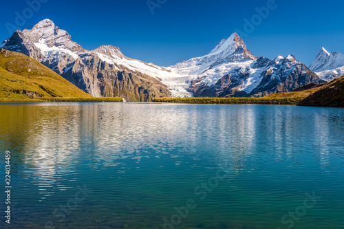 Encountering Bachalpsee during the famous hiking trail from First to Grindelwald (Bernese Alps, Switzerland). You can have great views on mountains like the Eiger, Monch and Jungfrau. © Chris