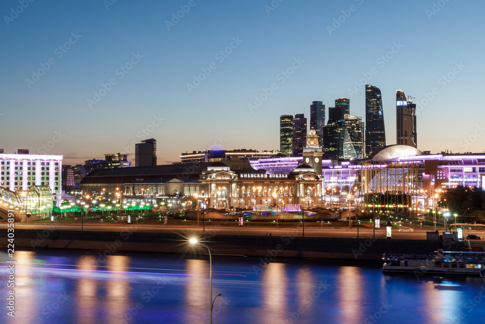Obraz premium panorama of Moscow, Kievskiy railway station and and skyscrapers, beautiful Moscow river, traffic along the river and the embankment