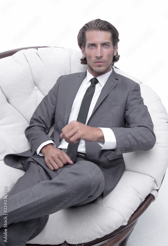 businessman sitting in a comfortable big chair businessman sitting in a comfortable big chair