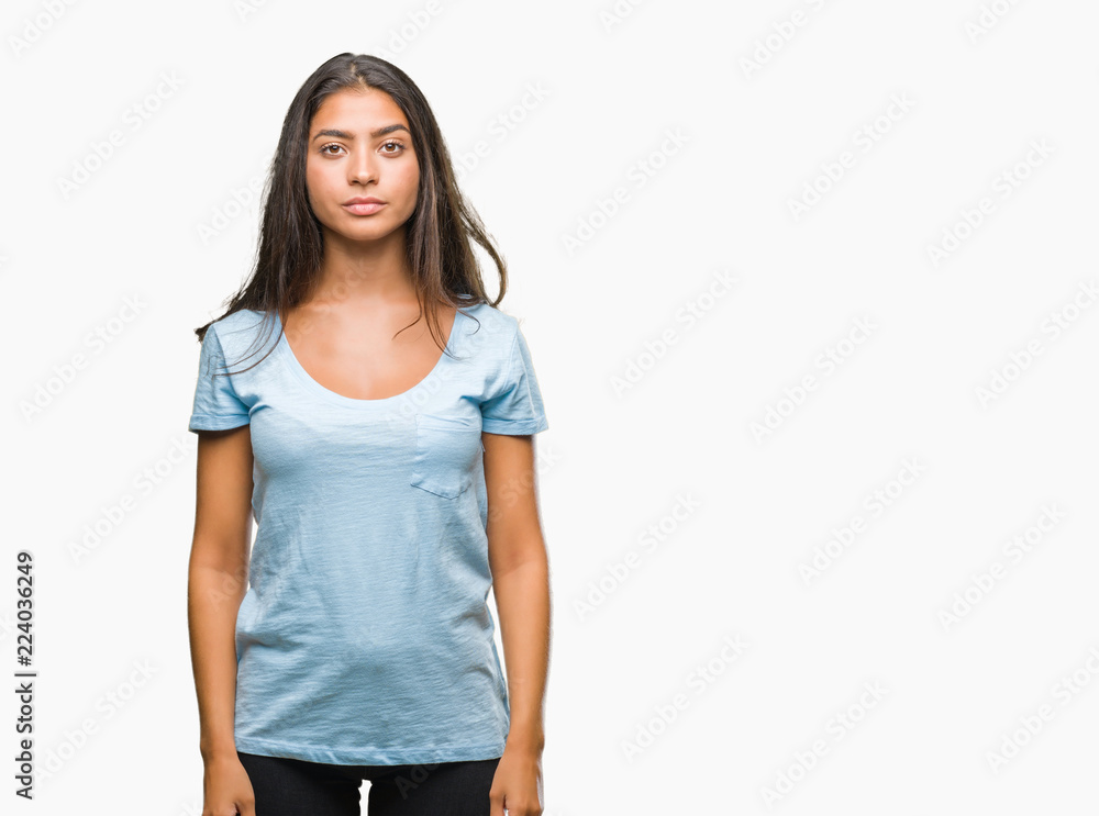 Obraz premium Young beautiful arab woman over isolated background with serious expression on face. Simple and natural looking at the camera.