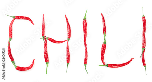 Word chili written from red hot pepper letters isolated on white background