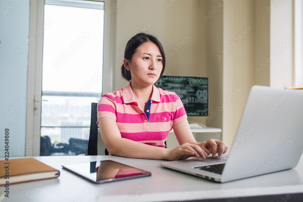 young woman working with computer young woman working with computer