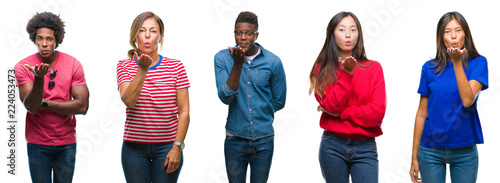 Composition of african american, hispanic and chinese group of people over isolated white background looking at the camera blowing a kiss with hand on air being lovely and sexy. Love expression.