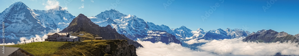 Panorama over Mannlichen at the Bernese Alps (Berner Oberland, Switzerland). It is a mountain (2,343 metre) reachable from Wengen with a aerial cableway or from Grindelwald using a gondola cableway.
