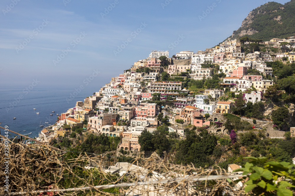 Panorama of Positano with houses climbing up the hill, Campania, Italy