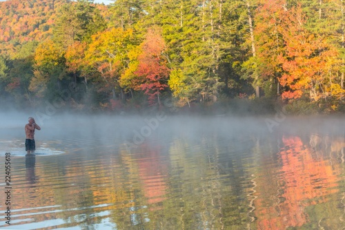 Cold morning swim in Autumn - New Hampshire