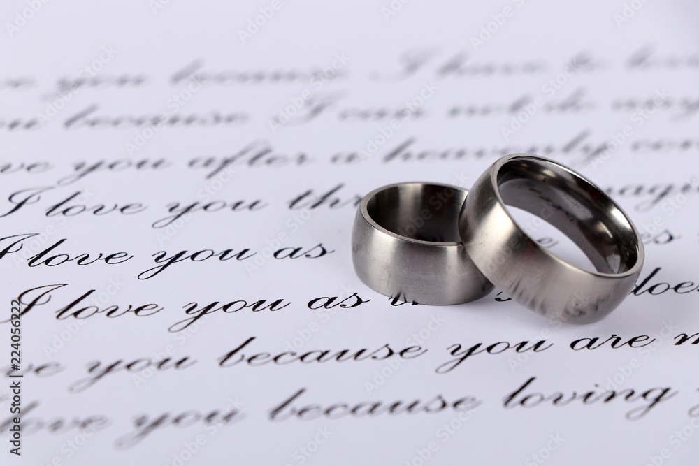 I love you - wedding rings on a handwritten love letter with a declaration of love I love you - wedding rings on a handwritten love letter with a declaration of love
