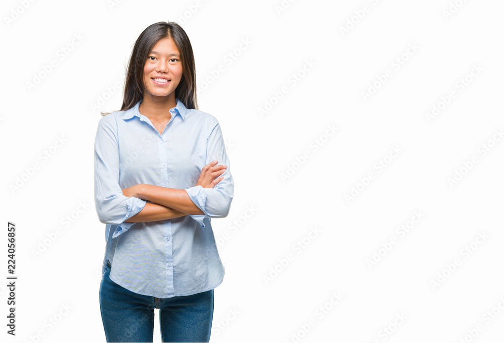 Young asian business woman over isolated background happy face smiling with crossed arms looking at the camera. Positive person. Young asian business woman over isolated background happy face smiling with crossed arms looking at the camera. Positive person.