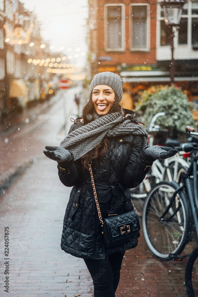 girl in the street in the rain