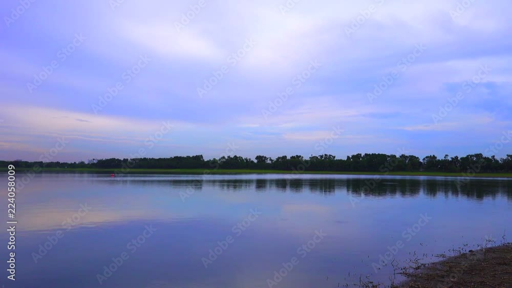 beautiful landscape with peaceful of water surface and sunrise on the lake view or sunrise over river in twilight time. beautiful landscape with peaceful of water surface and sunrise on the lake view or sunrise over river in twilight time.
