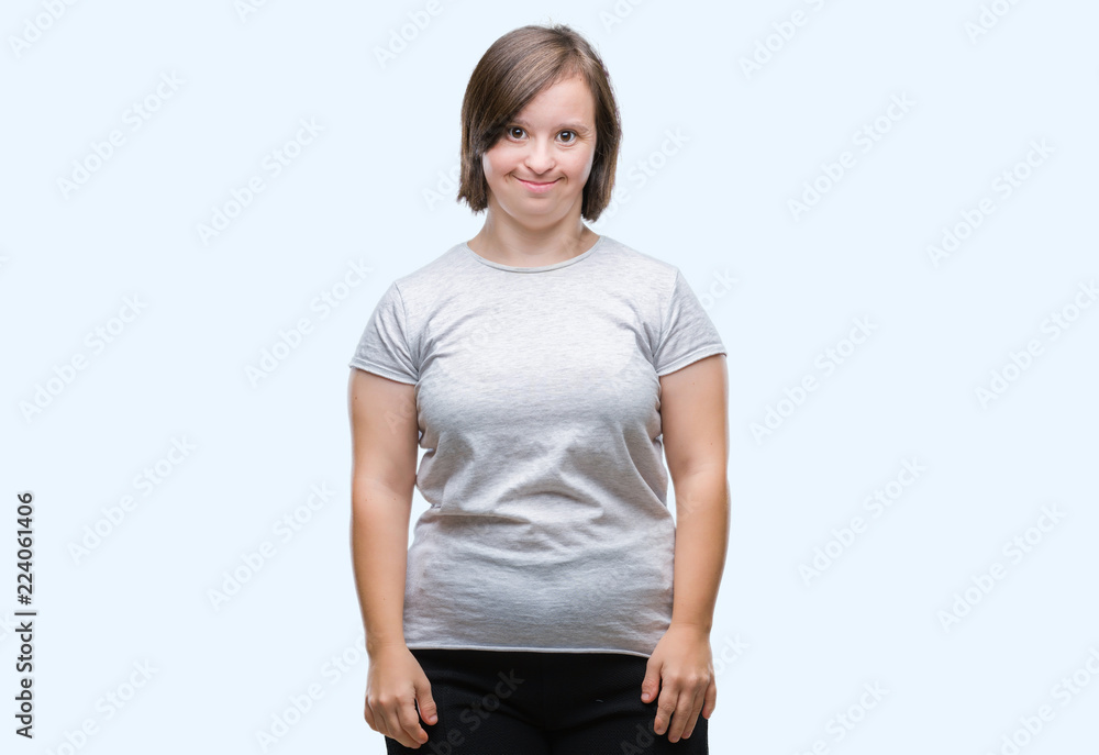 Young adult woman with down syndrome over isolated background with a happy and cool smile on face. Lucky person. Young adult woman with down syndrome over isolated background with a happy and cool smile on face. Lucky person.