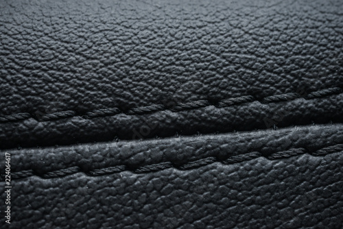 Detailed image of a car leather pleats stitch work.