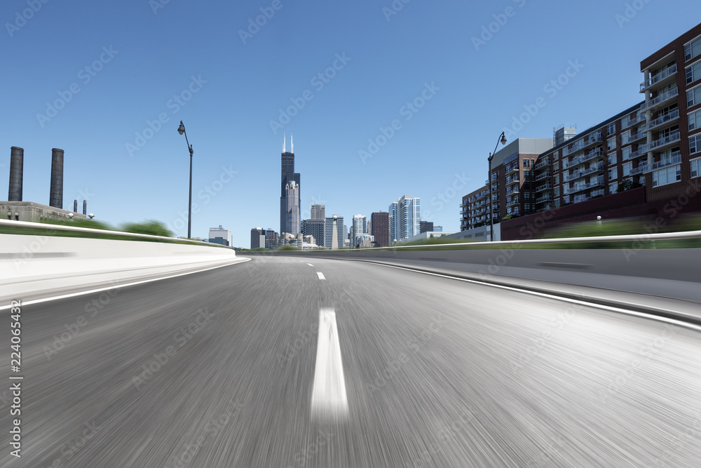 empty highway through modern city empty highway through modern city