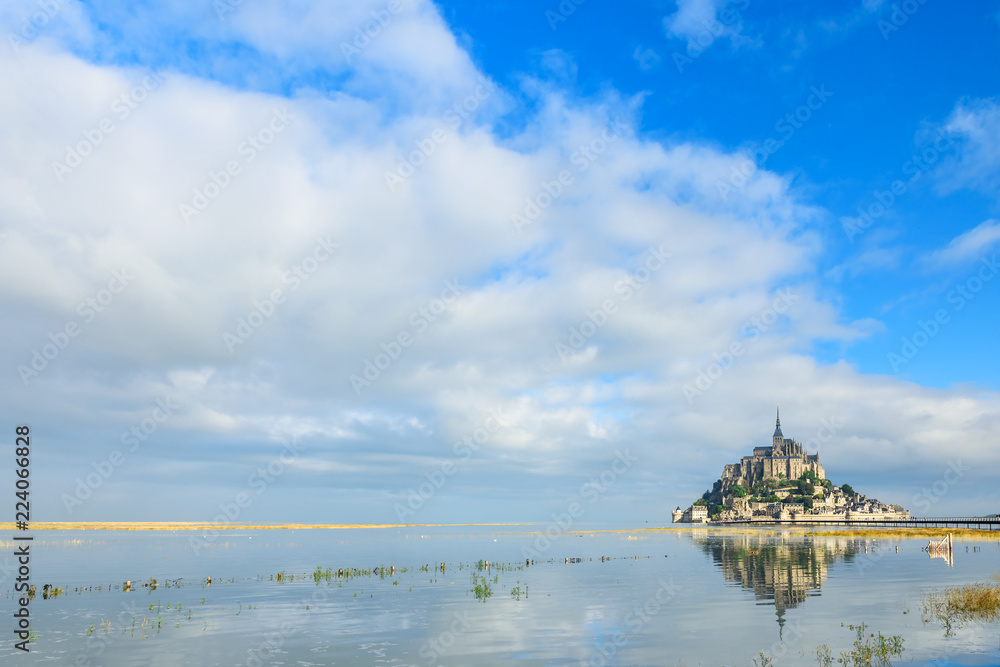 Mont Saint Michel abbey on the island with reflection in water, Normandy, Northern France, Europe