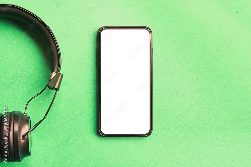 Headphones and smartphone on colorful background. Headphones and smartphone on colorful background.