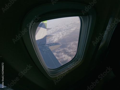 Aiplane Aircraft windows view on the wing aircraft, airlines , aviation skyline transportation