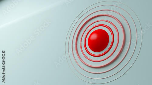 Ball with rough red paint and fading color circles around it. 