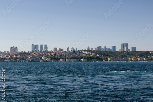 View of Bosphorus and European side in Istanbul. It is a sunny summer day. Skyscrapers are also in the view. © theendup