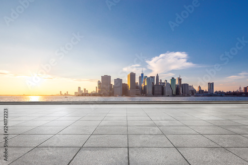 empty floor with modern cityscape in new york © zhu difeng