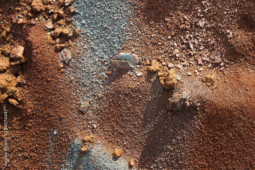 Red earth or soil background. Tropical laterite soil background of red